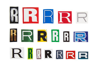 Alphabet letter R cutting from magazine paper. Newspaper clippings with letter R isolated on white...