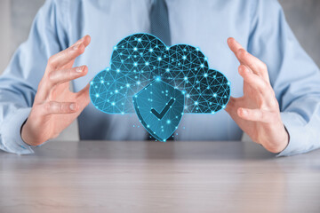 Cloud technology. Polygonal wireframe cloud storage sign with shield with a tick on dark blue....