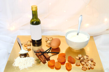 Ingredients for a peach and pistachio cake. Festive holiday background. Selective focus.