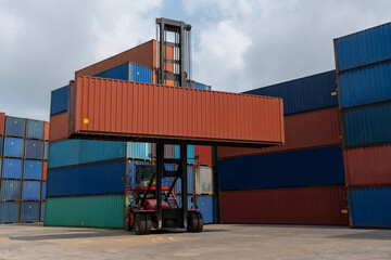 Cargo container for overseas shipping in shipyard with heavy machine . Logistics supply chain...