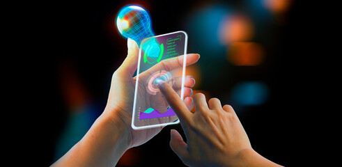 Technology point to the hologram on his smartphone the concept of communication network, cyber...