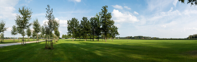 Werchter, Flemish Brabant Region, Belgium - 09 23 2021: Path and green meadows of the festival and concert fields