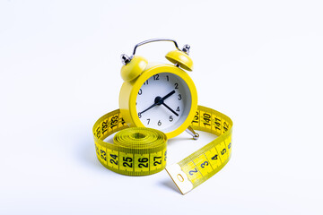 weight loss concept, watch isolate with measuring tape on white background, isolate