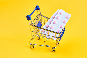 drug trolleys service delivery shopping pharmacy yellow background