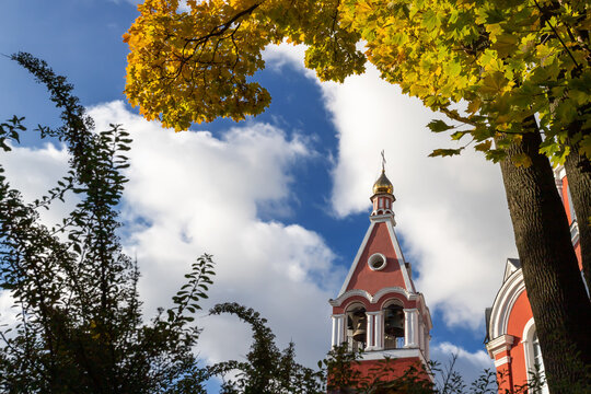 christian church and autumn leaves
