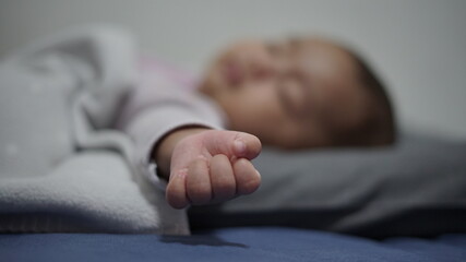 cute baby hand fall asleep at night