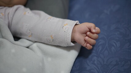 baby hand holding at the outside