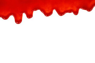 Red ketchup dripping on white background