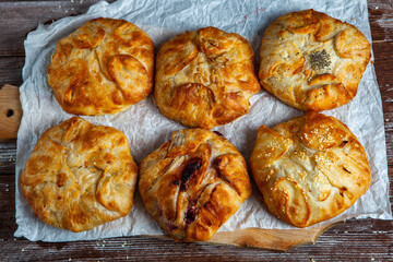 Traditional fried pies from Romania with potatoes, cheese and cabbage. Romanian food.