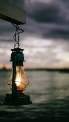 Sea Lantern on the background of the night sky and sea