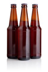 Three brown beer bottles