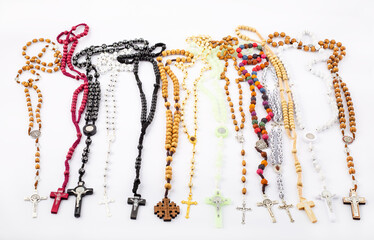 Fototapeta premium Set of traditional christian holy religious symbol rosary necklace isolated on white background