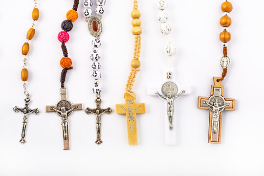 Set of traditional christian holy religious symbol rosary necklace isolated on white background