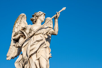 ROME, ITALY - SEPTEMBER 1, 2021: Angel with the Lance  on the Ponte Sant'Angelo - Angels bridge by...