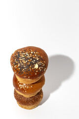 Assortment of small round brioche buns with homemade seeds