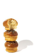 Fototapeta na wymiar Assortment of small round brioche buns with homemade seeds