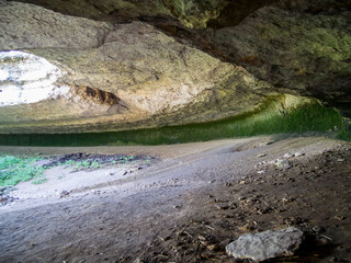 Cave of Neanderthals under a canopy in Krasnaya Balka (White Rock), Belogorsk, Crimea