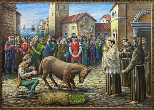 ROME, ITALY - SEPTEMBER 2, 2021: The painting of St Anthony and the Miracle of the Mule in the church Basilica di Sant'n Antonio al Laterano by author De Meo (1987).