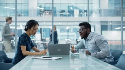 Multiethnic Diverse Office Conference Room Meeting: Team of Two Creative Entrepreneurs Talk, Discuss Growth Strategy. Stylish Young Businesspeople work on Investment in Real Estate and Commodities.
