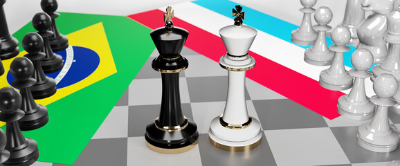 Brazil and Luxembourg - talks, debate, dialog or a confrontation between those two countries shown as two chess kings with flags that symbolize art of meetings and negotiations, 3d illustration