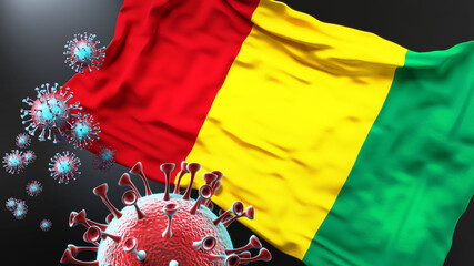 Guinea and the covid pandemic - corona virus attacking national flag of Guinea to symbolize the fight, struggle and the virus presence in this country, 3d illustration