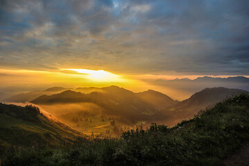 amazing sunrise at the alps in Germany at golden hour