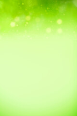 Defocused green bokeh abstract light background.