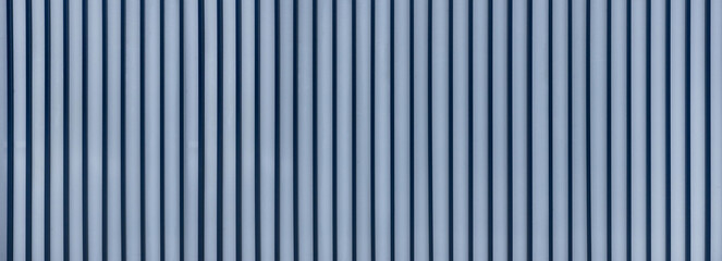Obraz premium weathered metal siding fence background