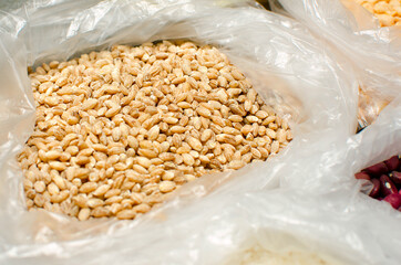 Pearl barley for cooking tasty and healthy porridge. Healthy breakfasts. Close-up, selective focus.