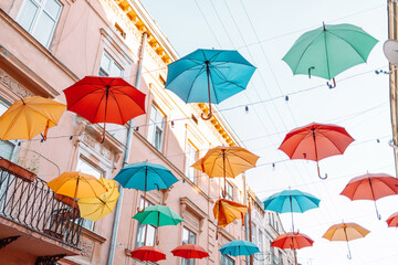 Fototapeta na wymiar Colorfull umbrellas as festival decoration in city centre.