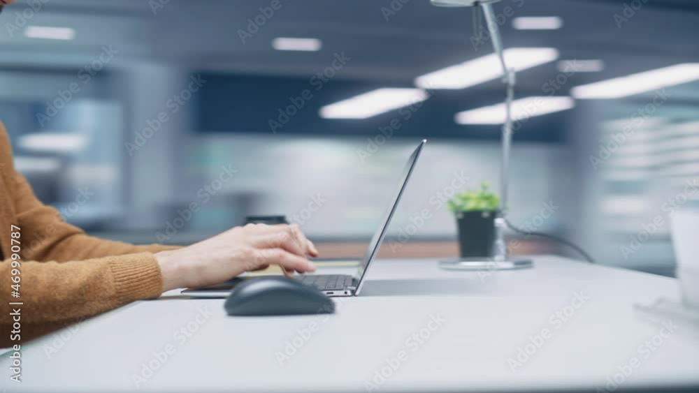 Poster 360 degree modern office: caucasian businessman sitting at his desk working on a laptop computer. ma