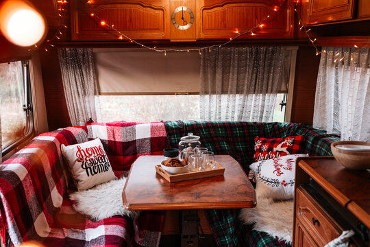 Cozy Kitchen Interior In Trailer Of Mobile Home Or Recreational Vehicle, Concept Of Family Local Travel In Native Country On Caravan Or Camper Van And Camping Life In Winter, Christmas And New Year