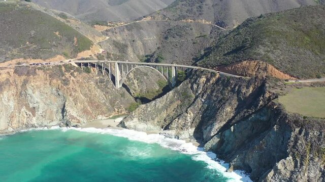 The Pacific Ocean washes onto the scenic coast of California near Big Sur. The famous Pacific Coast Highway runs along this amazing shore.