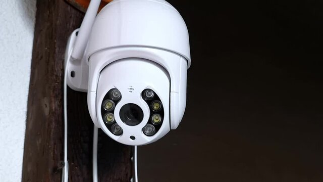 White CCTV Camera With Antennas Rotates And Records Moving Objects. Private Property Security System. Outdoor Video Surveillance. Footage. Copy Space. Web Cam. Street Control. Distance Watch. Smart.