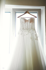 The perfect wedding dress in the room of the bride