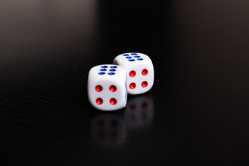 Playing cubes on a wooden table closeup