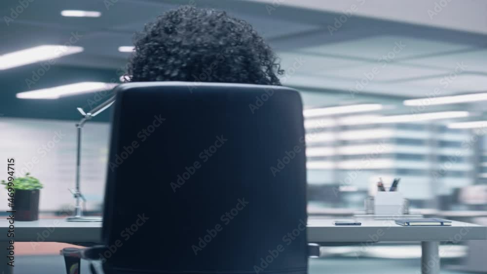 Poster 360 degree time-lapse office: productive businessman sitting at his desk working on a laptop compute