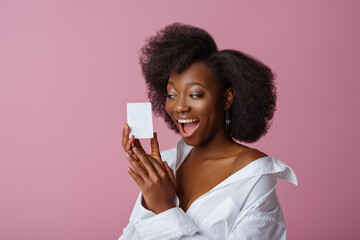 Yong beautiful happy smiling surprised African American woman, model wearing elegant jewelry,...