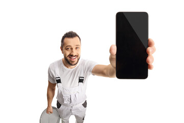House painter holding a smartphone in front of camera