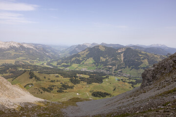 Naklejka premium Amazing hiking day in the alps of Switzerland. Wonderful view over a beautiful lake called Brienzersee. What an amazing view.
