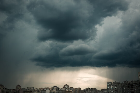 Moody Rainy Sky Over Modern City Residential District. Low Angle Shot.