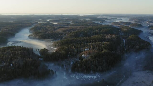 Foggy sunrise around hills