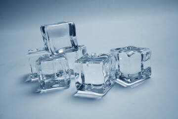 ice cubes on the glass background
