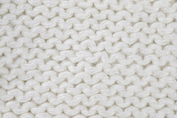 the product is made of woolen threads, connected by various types of loops on the spokes
