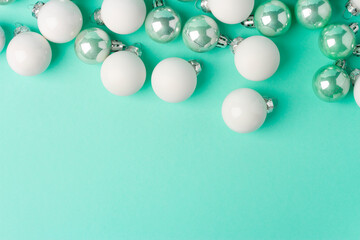 Decorative balls for Christmas and New Year on a mint background