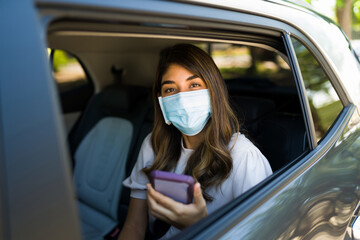 Latin female passenger in the car