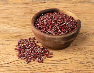 Azuki beans in a bowl over wooden table