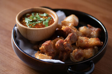 Deep-fried pork belly with fish sauce and spicy dipping sauce