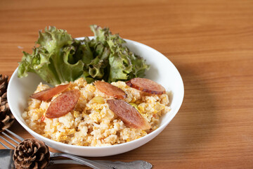 Fried rice with chinese sausage(Kun Chiang fried rice) in a white plate