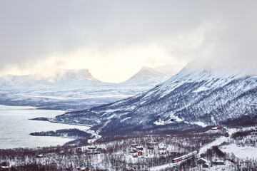 Vinter wiev towards Abisko with lapporten valley and Tornetr&auml;sk lake, famous sights of the Swedish Lapland seen from Bj&ouml;rkliden montains top.
